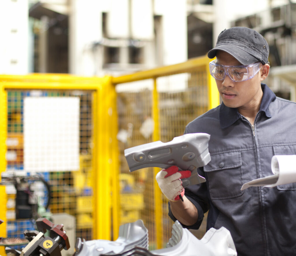 Employee inspecting product